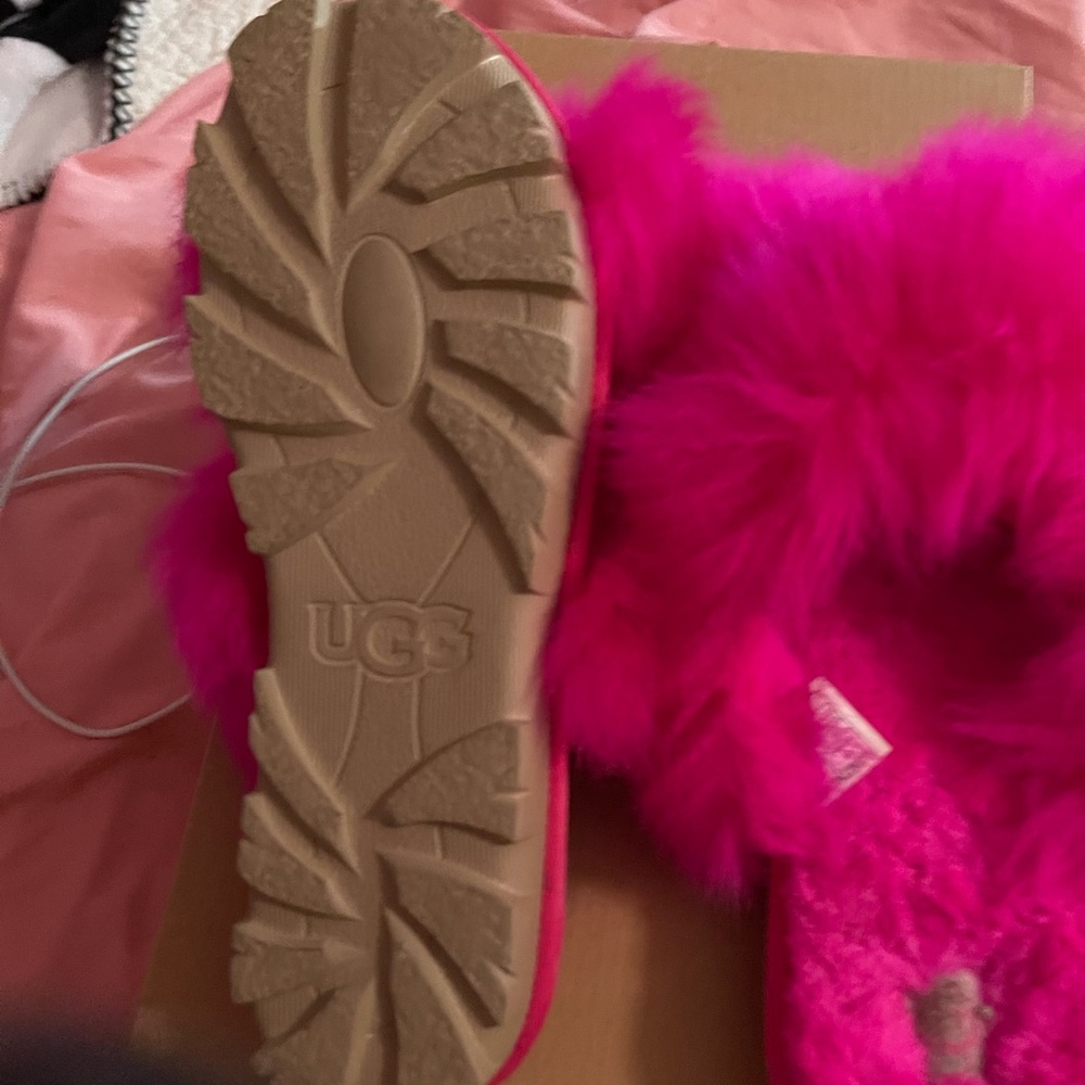 Fabulous hot pink fuzalicuous UGG slides.